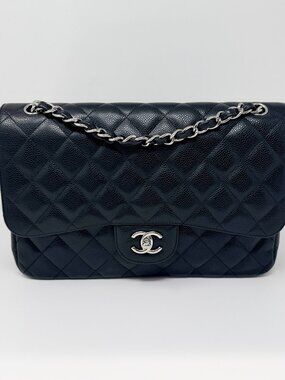 Chanel Quilted Black Double Flap Jumbo Caviar Bag